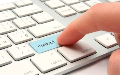 Person typing on computer keyboard